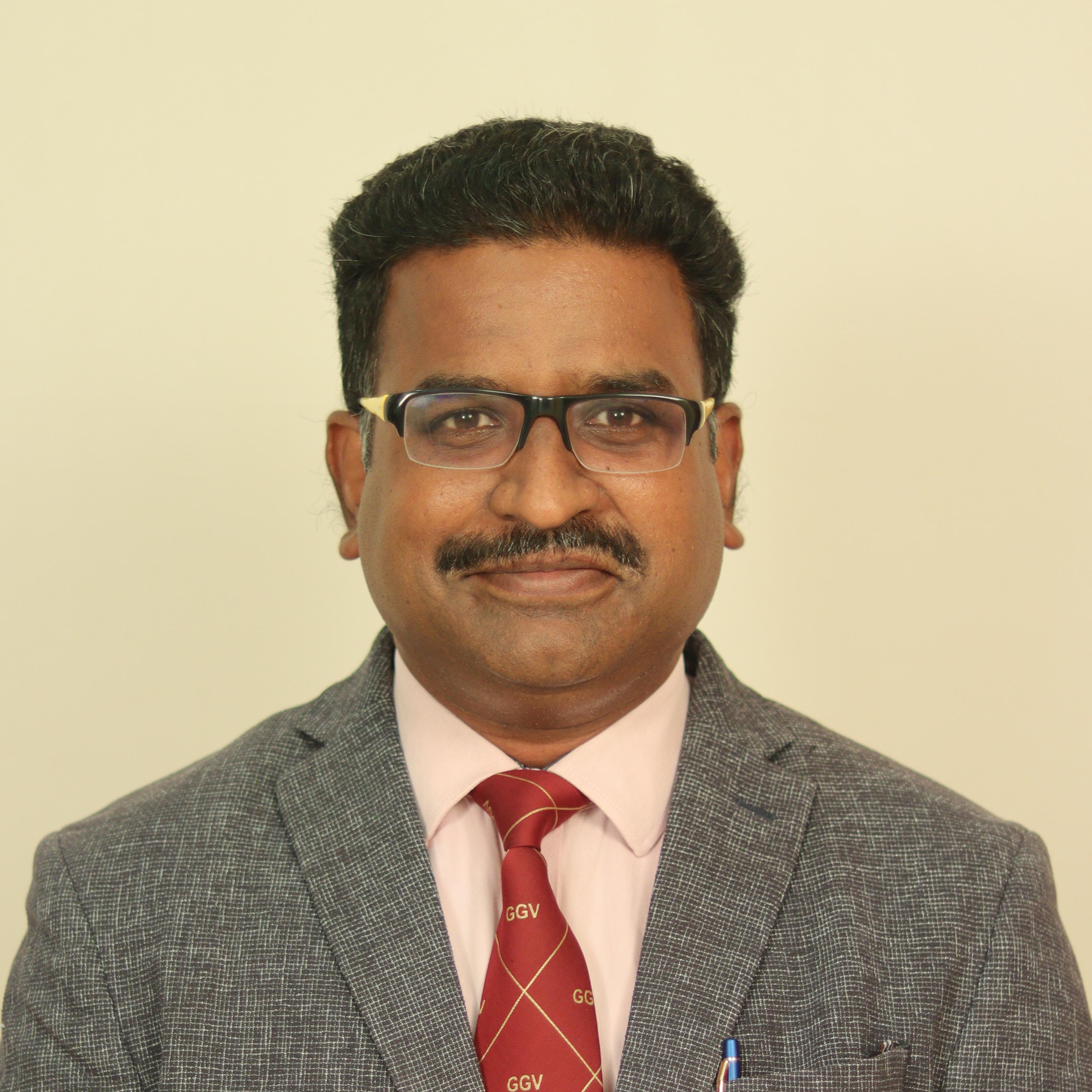 Dr. K. Kesavan